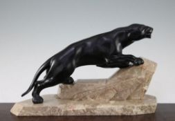 A French Art Deco black painted model of a panther, on a stylised marble base, unsigned, 15.75in.