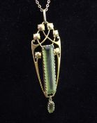 An Edwardian Art Nouveau Murrle Bennett & Co 15ct gold and peridot drop pendant, with pierced