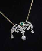A 15ct gold, emerald and diamond drop pendant on a 9ct gold chain, of demi lune form with three