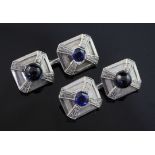 A pair of platinum and sapphire octagonal cufflinks, set with cabochon and round cut stones with a