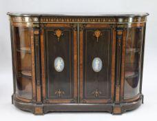 A Victorian ebonised, amboyna and marquetry inlaid credenza, with ormolu mounts and classical