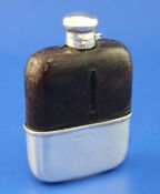 A George V silver and leather mounted glass hip flask, with silver cup base, John Collard Vickery,