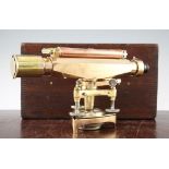 A Stanley polished brass and copper theodolite, No.45098, with a mahogany box