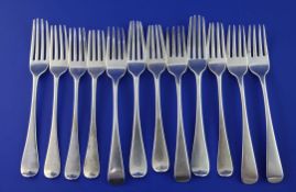 A harlequin set of twelve 19th century silver dessert forks, various patterns, dates and makers,