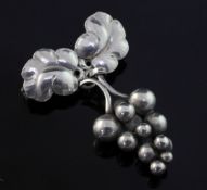 A mid 20th century Georg Jensen sterling silver leaf and grapes drop brooch, design no. 217A,
