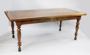 A 19th century provincial French oak and fruitwood rectangular dining table, one frieze fitted