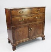 A George III mahogany cabinet, fitted with two short drawers above single long drawer with two