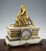 A mid 19th century French ormolu mounted white marble mantel clock, modelled with a bronze of a