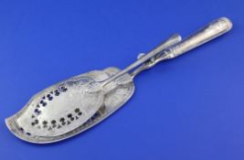 A pair of mid 19th century Russian 84 zolotnik silver fish serving tongs, with sprung auxiliary