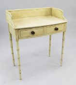 A Regency cream painted bowfront washstand, with three quarter gallery back above two drawers, on