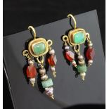 A pair of antique Roman style gold and gem set drop earrings, each with cabochon emerald above three