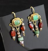 A pair of antique Roman style gold and gem set drop earrings, each with cabochon emerald above three