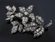 A Victorian gold, silver and diamond trembleuse floral spray brooch, set with old cut stones, 2.