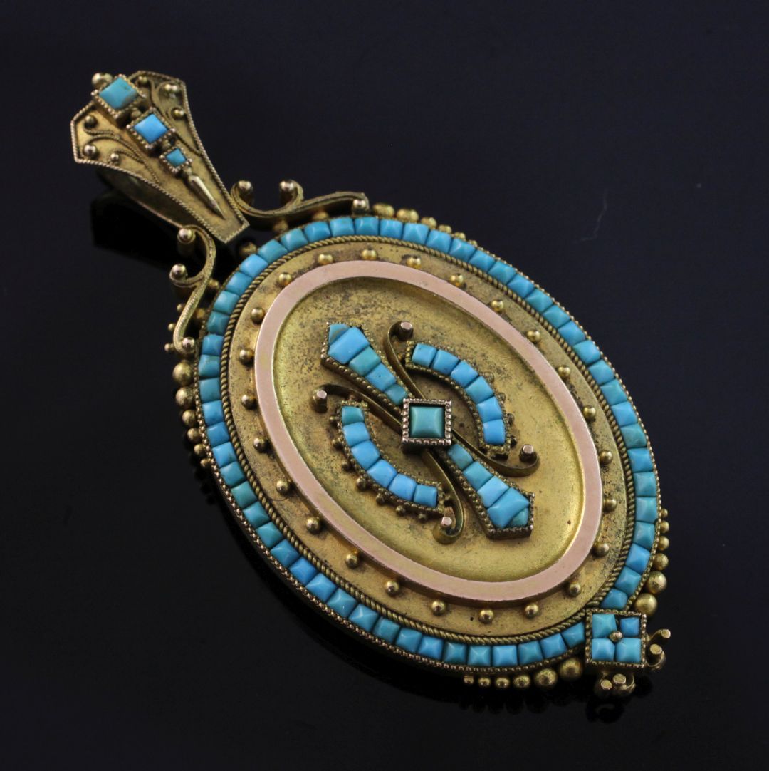 A Victorian Etruscan style gold and turquoise set oval pendant locket, with beaded and scroll - Image 2 of 2