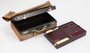 A 20th century Louis Vuitton travelling vanity case, with internal folding compartments, with