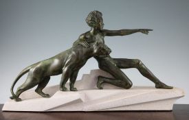 Max Le Verrier. A French Art Deco bronze modelled as a young male with attendant panther, on a