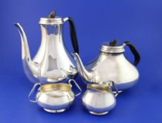 A stylish 1950's Danish silver four piece tea and coffee service by Svend Toxvaerd, of baluster