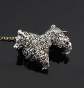 A Victorian gold and silver, rose cut diamond set dog brooch modelled as a Pomeranian, with