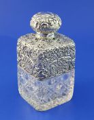 A late Victorian silver mounted hobnail cut glass scent bottle, of rectangular form, with hinged lid