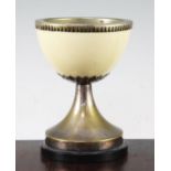 Anthony Redmile. An ostrich egg goblet, with silver plated mounts, on circular plinth base, marked