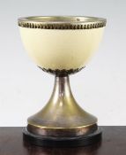 Anthony Redmile. An ostrich egg goblet, with silver plated mounts, on circular plinth base, marked