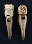 A pair of carved beech nutcrackers, modelled as a gent with peaked cap and large moustache, possibly