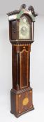 Monkhouse of Carlisle. A Regency inlaid mahogany musical longcase clock, the 13 inch arched brass