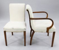 A set of eight Art Deco walnut dining chairs, with scroll backs and over-stuffed seats, two with
