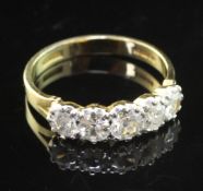 An early 1990's 18ct gold and five stone diamond half hoop ring, set with round cut stones, size P.