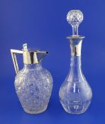 A late Victorian silver mounted and hobnail cut glass claret jug, of baluster form, with angular