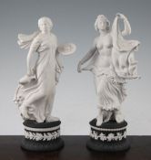 Two Wedgwood jasper figures of herculaneum dancers, from a limited edition of 2000, the classical