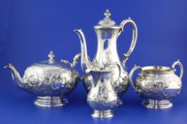 An Edwardian four piece silver tea and coffee service by Goldsmiths & Silversmiths Co Ltd, with