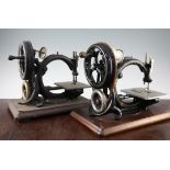 Two cased Wilcox & Gibbs sewing machines