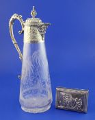 A Victorian plate mounted glass claret jug, with Bacchanalian spout, the glass decorated with