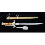 A German WWII Third Reich naval officer's dagger, by F.W. Holler Solingen, with wire bound amber