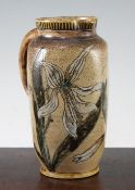 A Martin Brothers stoneware jug, c.1884, incised with orchids predominantly decorated in white,