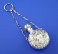 A late Victorian silver combination moon shaped scent flask and compact, embossed with foliate