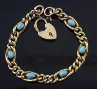 An Edwardian 9ct gold curb link bracelet set with six oval turquoise cabochons, with heart shaped
