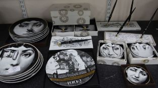 A collection of Fornasetti Temi e Variazioni and musical trophy pattern items, to include nine