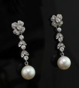 A pair of mid 20th century white metal, cultured pearl and diamond set drop earrings, of foliate