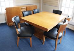 An Art Deco maple dining room suite, comprising a large sideboard, dining table and six chairs,
