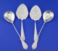 Two pairs of late 19th century Norwegian silver servers by N.M. Thine, with engraved decoration