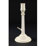 A 1930's carved and turned ivory table lamp, by William G Collins, with tapering twist column on