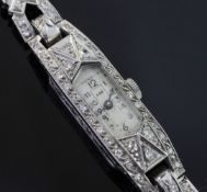 A lady's 1920's/1930's white gold and diamond set cocktail watch, with Favre Leuba movement and