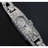 A lady's 1920's/1930's white gold and diamond set cocktail watch, with Favre Leuba movement and