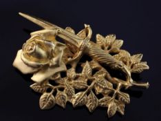 A 1990's gilded "Rose & Dagger" brooch, bearing the signature Rene Magritte, stamped en verso "