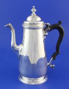 A mid 18th century silver coffee pot by Richard Gurney & Thomas Cook?, of tapering cylindrical form,