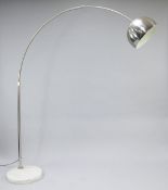 A 20th century floor standing chrome and marble bow lamp, with circular adjustable shade, on