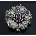 A late 19th/early 20th century French 18ct gold and silver, garnet and rose cut diamond set