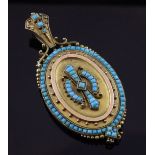 A Victorian Etruscan style gold and turquoise set oval pendant locket, with beaded and scroll
